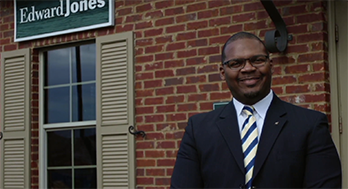 Financial Advisor Thomas Scott standing in front of Edward Jones Branch Office