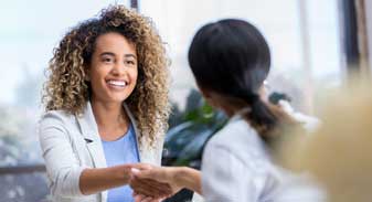 Woman Greeting Client