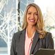 Women holding portfolio with Fortune 2024 Best Workplace for Women