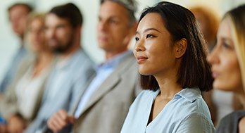 Diverse group listening intently