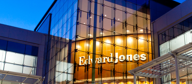 Exterior night photo of an Edwards Jones headquarters building.