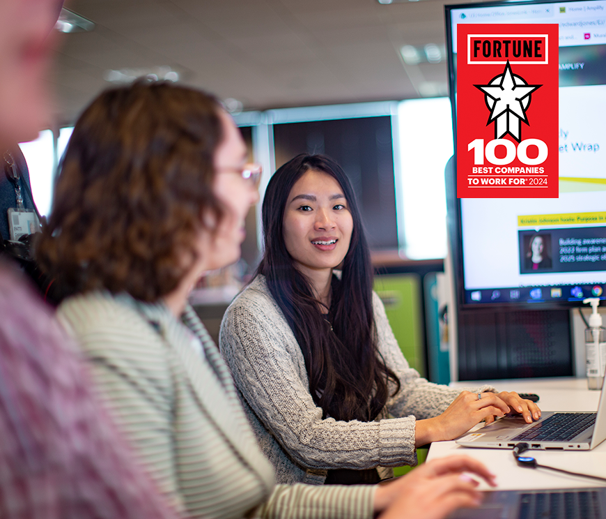 Young asian woman presenting to her colleagues.